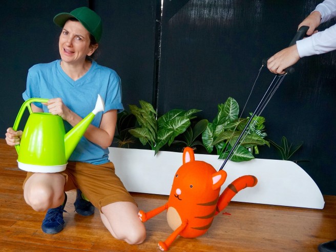 Boy Taryn Bennett with one of the puppets